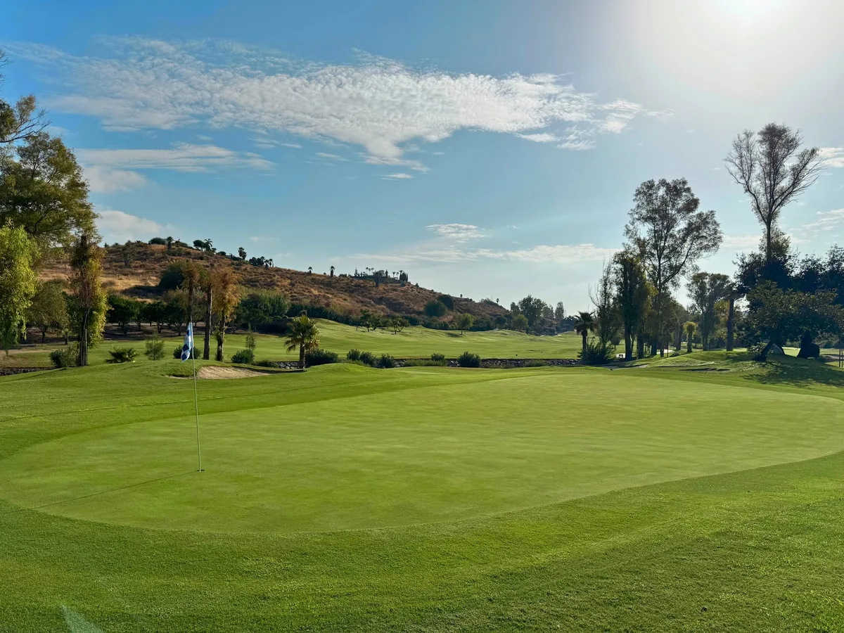 Morning light across the practice green